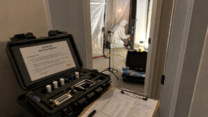 Air-O-Cell spore trap testing during black mold removal verification phase in Spanish Fork family home