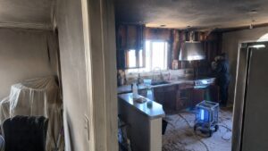 Kitchen fire restoration with hydroxyl generator deodorization and soot removal in Spanish Fork residential home